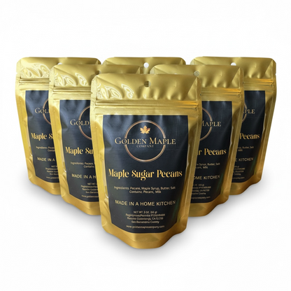 Six packages of Golden Maple Company Maple Sugar Pecans on a white background
